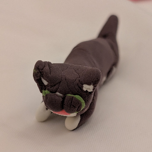 Clay figure of Kizzy the cat by Lao